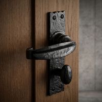 The Black Scalloped Lever Bathroom Door Handle Mounted on a Door Leading to a Modern Bathroom - Digital Illustration
