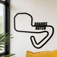 The Brands Hatch Motor Racing Circuit Black Steel Wall Art with Race Track Name on it Positioned on a Living Room Wall - Digital Illustration The Brands Hatch Motor Racing Circuit Black Steel Wall Art with Race Track Name on it Positioned on a Living Room Wall - Digital Illustration