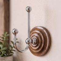 The Bright Chrome Hook on Wooden Backplate on a Cream Textured Wall - Digital Illustration 