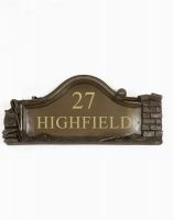 The Bronze Builders House Name Sign on a White Background The Bronze Builders House Name Sign on a White Background