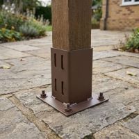The Brown Bolt Down Fence Post Support shown on a Stone Patio - Digital Illustration The Brown Bolt Down Fence Post Support shown on a Stone Patio - Digital Illustration
