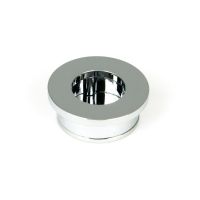 The Circular Pocket Door Edge Pull in Polished Chrome Shown from the Front Laying on a White Background