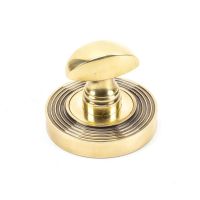 The Concealed Beehive Bathroom Turn & Release Set - Aged Brass on a White Background The Concealed Beehive Bathroom Turn & Release Set - Aged Brass on a White Background