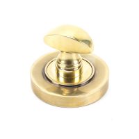 The Concealed Plain Bathroom Turn & Release Set - Aged Brass on a White Background The Concealed Plain Bathroom Turn & Release Set - Aged Brass on a White Background