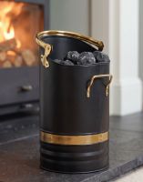 The Contemporary Black Coal Hod With Brass Handles in Front of a Sleek Black Fireplace - Digital Illustration 