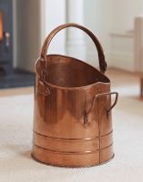 The Copper Finish Traditional Fireside Log and Coal Bucket Placed in a Contemporary Living Room Carpet - Digital Illustration The Copper Finish Traditional Fireside Log and Coal Bucket Placed in a Contemporary Living Room Carpet - Digital Illustration