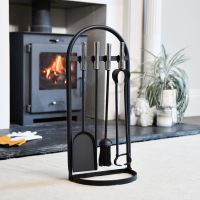 The Cradley Elite Companion Set in Chrome & Iron with a Wood Burner Stove Behind - Digital Illustration