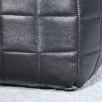 Close-up of the Black Leather on the Pouffe