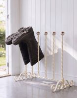 The Cream Grangewood 3 Pair Boot Rack Placed in a Contemporary Cottage Porch Entranceway - Digital Illustration 