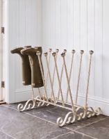 The Cream Hollinbury 6 Pair Boot Rack Placed in a Contemporary Garden Porchway Entrance Close up View - Digital Illustration The Cream Hollinbury 6 Pair Boot Rack Placed in a Contemporary Garden Porchway Entrance Close up View - Digital Illustration