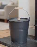 The Dark Grey Fireside Bucket on a Black Tiled Fire Place Perfect for Disposing of Embers - Digital Illustration 