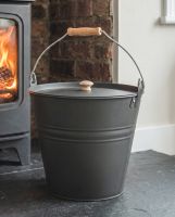 The Dark Grey Fireside Bucket on a Black Tiled Fire Place Perfect for Disposing of Embers - Digital Illustration 