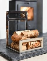The Decorative “Hinburn House” Contemporary Stainless Steel Log Store Placed next to a Log Burner Stove in a Contemporary Home - Digital Illustration The Decorative “Hinburn House” Contemporary Stainless Steel Log Store Placed next to a Log Burner Stove in a Contemporary Home - Digital Illustration