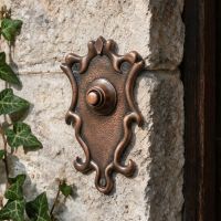The “Dubrowe Park” Antique Copper Ornate Bell Push on a Stone Wall Next to a Front Door with Ivy next to it - Digital Illustration The “Dubrowe Park” Antique Copper Ornate Bell Push on a Stone Wall Next to a Front Door with Ivy next to it - Digital Illustration