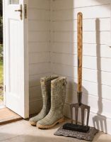 The Emily Garden Fork Boot Brush Positioned in a Sunny Cream Coloured Cottage Porch - Digital Illustration The Emily Garden Fork Boot Brush Positioned in a Sunny Cream Coloured Cottage Porch - Digital Illustration