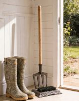 The Emily Garden Fork Boot Brush Placed in a Garden Entranceway Porch - Digital Illustration The Emily Garden Fork Boot Brush Placed in a Garden Entranceway Porch - Digital Illustration