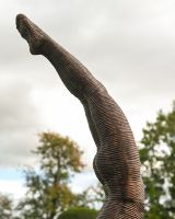 The Equilibrium Handstand Garden Sculpture in Copper Showing a Side View of the Legs