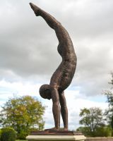 The Equilibrium Handstand Garden Sculpture in Copper Shown from the Side