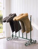 The Estrook Forest Fern Green Three Pair Boot Rack Placed in a Sunny Wooden Porch Entrance - Digital Illustration
