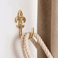 The ’Fleur De Lys’ Curtain tie back hook version 1 in a Modern White Living Room - Digital Illustration The ’Fleur De Lys’ Curtain tie back hook version 1 in a Modern White Living Room - Digital Illustration