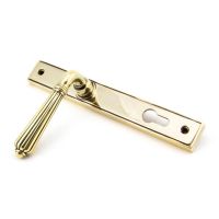 The Fluted Slimline Exterior Door Handle - Aged Brass Finish Shown from the Back The Fluted Slimline Exterior Door Handle - Aged Brass Finish Shown from the Back