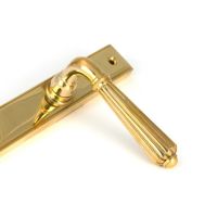 The Fluted Slimline Exterior Door Handle in a Polished Brass Finish Showing a Close up of the Handle The Fluted Slimline Exterior Door Handle in a Polished Brass Finish Showing a Close up of the Handle