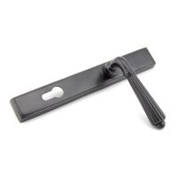 The Fluted Slimline Exterior Door Handle in an Aged Bronze Finish Shown Leaning to the Right The Fluted Slimline Exterior Door Handle in an Aged Bronze Finish Shown Leaning to the Right