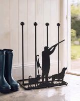 The Game Season Cocker Spaniel Steel Boot Rack Positioned on a Stone Tile Cottage Porch next to an Open Door - Digital Illustration 