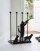 The Game Season Springer Spaniel Steel Boot Rack Placed on a Stone Tile Cottage Entrance Hallway- Digital Illustration