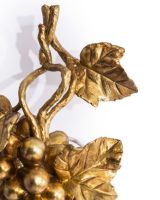 The Gold Finish Fruits of the Vine Wall Light with a Close up of the Detailing on the Leaves 