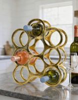 The Gold "Floating Bubbles" Wine Rack on a Dark Kitchen Countertop in a Modern Home - Digital Illustration 