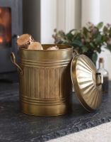The Gold Traditional Iron Log Bucket With Lid Filled with Logs next to a Lit Log Burner Stove - Digital Illustration The Gold Traditional Iron Log Bucket With Lid Filled with Logs next to a Lit Log Burner Stove - Digital Illustration