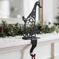 The Gonk with Star Hat Stocking Holder Placed on a White Mantelpiece - Digital Illustration The Gonk with Star Hat Stocking Holder Placed on a White Mantelpiece - Digital Illustration