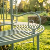 The Green "Averley" Circular Wrap-Around Garden Tree Bench with a Close up of one of the Armrests - Digital Illustration The Green "Averley" Circular Wrap-Around Garden Tree Bench with a Close up of one of the Armrests - Digital Illustration