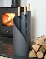 The Grey Contemporary "Waves" Companion Set next to a Traditional Log Burner Stove - Digital Illustration The Grey Contemporary "Waves" Companion Set next to a Traditional Log Burner Stove - Digital Illustration