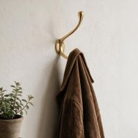 The "Hackenly Park" Brass Hook in an Entrance Hallway with a Coat on it - Digital Illustration The "Hackenly Park" Brass Hook in an Entrance Hallway with a Coat on it - Digital Illustration
