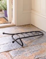 The Hampton Traditional Boot Jack Placed on a Stone Tiled Floor Cottage Porch - Digital Illustration 