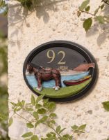 The Handpainted Canal Boat House Number Sign on a House Wall Covered in Plants - Digital Illustration The Handpainted Canal Boat House Number Sign on a House Wall Covered in Plants - Digital Illustration