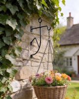 The Hanging Basket Stickman Bracket on a Decorative Cottage Garden Wall - Digital Illustration The Hanging Basket Stickman Bracket on a Decorative Cottage Garden Wall - Digital Illustration