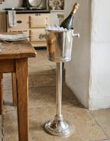 The Highbury Court Genuine Silver Plated Deluxe Wine & Champagne cooler with Stand in a Classic Country Kitchen - Digital Illustration