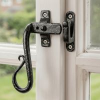 The Hook Plated Black Iron Casement Stay Mounted on a Handpainted White Wooden Window Frame - Digital Illustration 