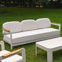 The Horizon 4 Piece Patio Suite Showing a Full View of the Sofa as well as Marble Effect Table