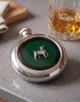 The Jack Russell Whiskey flask on a Kitchen Countertop next to a Tumbler The Jack Russell Whiskey flask on a Kitchen Countertop next to a Tumbler