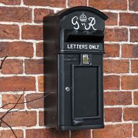 King George Post Box in Situ on a Brick Wall