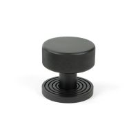 The Knurled Mortice/Rim Knob Set on a Beehive Rose in Aged Bronze Shown Upright on a White Background The Knurled Mortice/Rim Knob Set on a Beehive Rose in Aged Bronze Shown Upright on a White Background