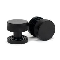 The Knurled Mortice/Rim Knob Set on a Beehive Rose in Black Shown Upright and on its Side The Knurled Mortice/Rim Knob Set on a Beehive Rose in Black Shown Upright and on its Side