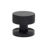 The Knurled Mortice/Rim Knob Set on a Beehive Rose in Matt Black Shown Upright on a White Background The Knurled Mortice/Rim Knob Set on a Beehive Rose in Matt Black Shown Upright on a White Background