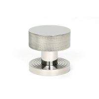 The Knurled Mortice/Rim Knob Set on a Beehive Rose in Polished Stainless Steel Shown Upright on a White Background The Knurled Mortice/Rim Knob Set on a Beehive Rose in Polished Stainless Steel Shown Upright on a White Background