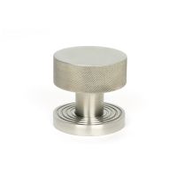 The Knurled Mortice/Rim Knob Set on a Beehive Rose in Satin Stainless Steel Shown Upright on a White Background The Knurled Mortice/Rim Knob Set on a Beehive Rose in Satin Stainless Steel Shown Upright on a White Background