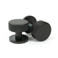 The Knurled Mortice/Rim Knob Set on a Plain Rose in Aged Bronze Shown Upright and on its Side The Knurled Mortice/Rim Knob Set on a Plain Rose in Aged Bronze Shown Upright and on its Side